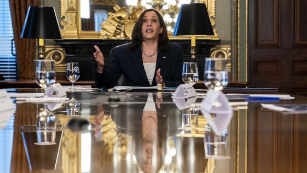Vice President Kamala Harris is reflected in a table as she speaks during the inaugural meeting of the Task Force on Worker Organizing and Empowerment, in Harris' ceremonial office, Thursday, May 13, 2021, on the White House complex in Washington - Sputnik International