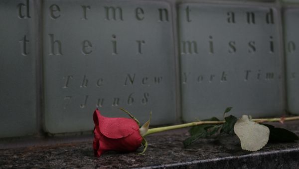 A rose lies on the ground at the Vietnam War Memorial in Manhattan on Veterans Day on November 11, 2020 in New York City. The annual parade in New York, which draws thousands of veterans and spectators from around the country and world, was held as a virtual event this year due to COVID-19. Despite the pandemic restrictions, veterans found numerous ways to honor those that served their country in the armed forces. - Sputnik International