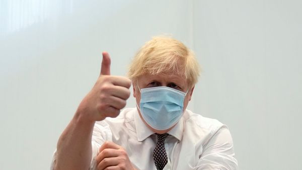 Britain's Prime Minister Johnson receives his second dose of the AstraZeneca coronavirus disease (COVID-19) vaccine, in London - Sputnik International