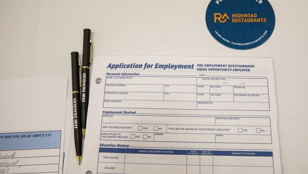 An employment application form is displayed during a restaurant job career fair organized by the industry group High Road Restaurants in New York City, U.S., May 13, 2021.  - Sputnik International