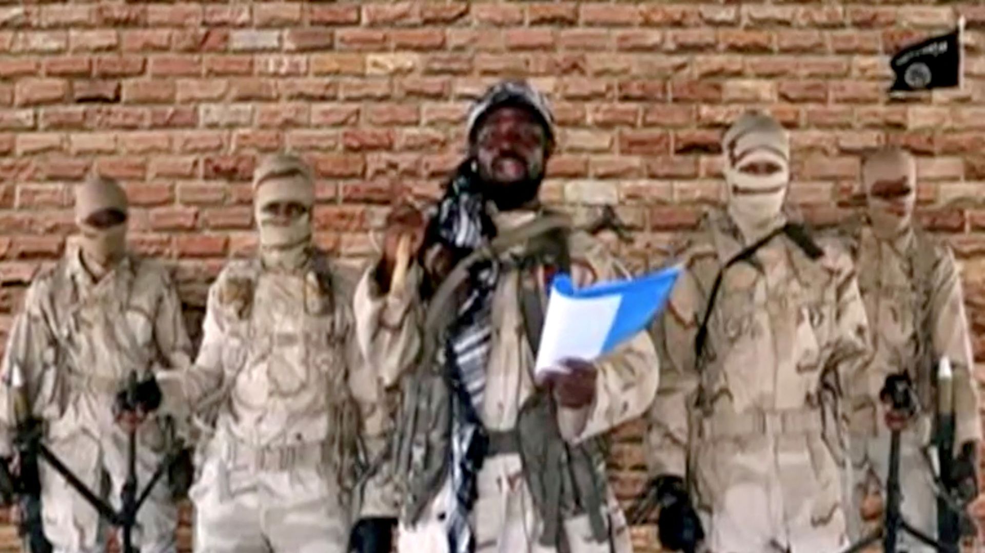 Boko Haram leader Abubakar Shekau speaks in front of guards in an unknown location in Nigeria in this still image taken from an undated video obtained on January 15, 2018. - Sputnik International, 1920, 06.06.2021