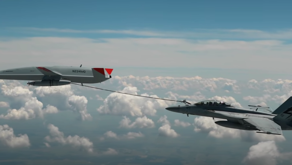 The MQ-25 T1 test asset has flown into the history books as the first unmanned aircraft to ever refuel another aircraft - piloted or autonomous - during flight. During this June 2021 flight test, the #MQ25 T1 test asset transferred fuel to an F/A-18 Super Hornet. After additional flight tests, this unmanned aerial refueling test asset will head to a U.S. Navy carrier for deck handling trials. - Sputnik International