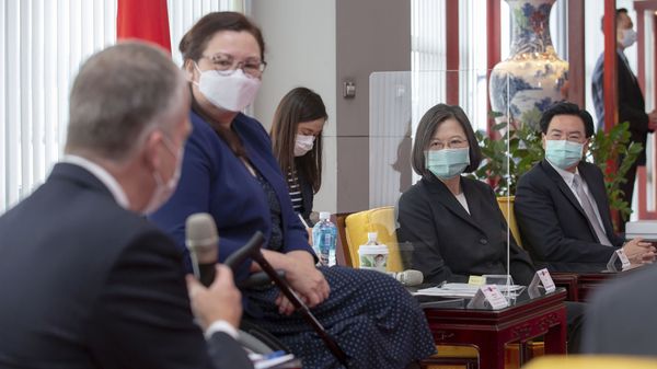 In this photo released by the Taiwan Presidential Office, President Tsai Ing-wen, second right, and Foreign Minister Joseph Wu, right, listen as U.S. Republican Sen. Dan Sullivan of Alaska at left speaks next to Democratic Sen. Tammy Duckworth of Illinois in Taipei, Taiwan, on Sunday, June 6, 2021 - Sputnik International