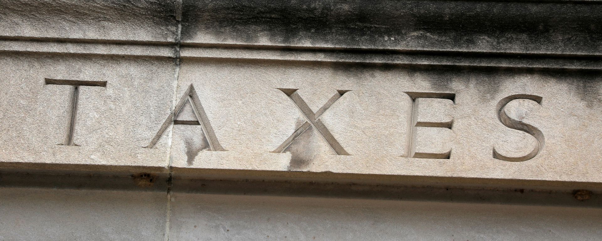 The word taxes is seen engraved at the headquarters of the Internal Revenue Service (IRS) in Washington, D.C., U.S., May 10, 2021. The word taxes is seen engraved at the headquarters of the Internal Revenue Service (IRS) in Washington, D.C., U.S., May 10, 2021. - Sputnik International, 1920, 08.06.2021