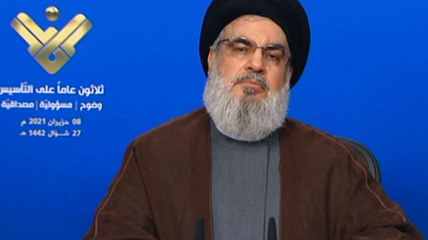 An image grab taken from Hezbollah's al-Manar TV on June 8, 2021, shows the leader of the Lebanese Shiite party Hassan Nasrallah delivering a televised speech from an undisclosed location to mark the anniversary of the TV network. - Sputnik International