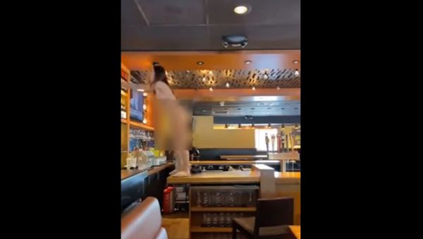 Naked woman Florida - Sputnik International