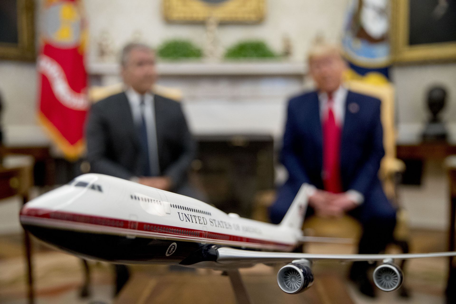A model of the new Air Force One design sits on a table as President Donald Trump, right, meets with Colombian President Ivan Duque, left, in the Oval Office of the White House, Monday, March 2, 2020, in Washington. - Sputnik International, 1920, 27.04.2022
