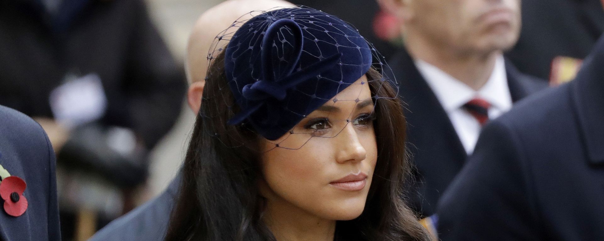 In this Thursday, Nov. 7, 2019 file photo Meghan the Duchess of Sussex stands after she and her husband Britain's Prince Harry placed a Cross of Remembrance as they attend the official opening of the annual Field of Remembrance at Westminster Abbey in London In this Thursday, Nov. 7, 2019 file photo Meghan the Duchess of Sussex stands after she and her husband Britain's Prince Harry placed a Cross of Remembrance as they attend the official opening of the annual Field of Remembrance at Westminster Abbey in London - Sputnik International, 1920, 10.11.2021