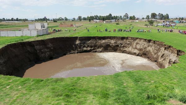 An aerial view of a sinkhole found in a farmland in Santa Maria Zacatepec, Puebla, Mexico May 30, 2021 is shown in this screen grab obtained from a social media video.  - Sputnik International