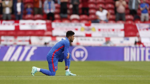 International Friendly - England v Romania - Riverside Stadium, Middlesbrough, Britain - June 6, 2021 England's Jadon Sancho kneels in support of the Black Lives Matter campaign before the match. - Sputnik International