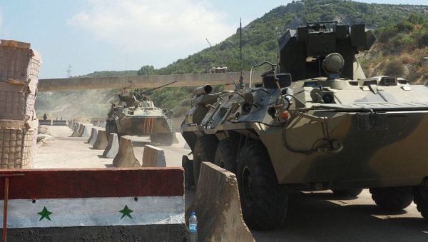 Russian and Turkish servicemen during a joint patrol in the Idlib province in Syria. - Sputnik International