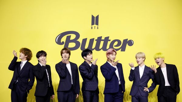 Members of K-pop boy band BTS pose for photographs during a photo opportunity promoting their new single 'Butter' in Seoul - Sputnik International
