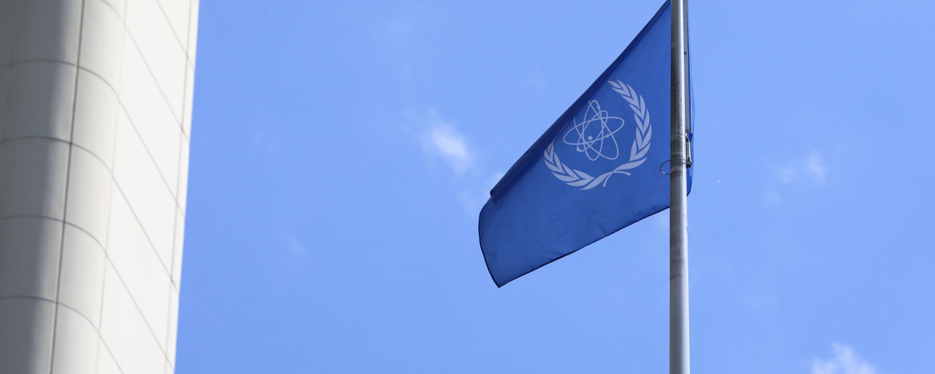 The flag of the International Atomic Energy Agency, IAEA waves at the entrance of the Vienna International Center in Vienna, Austria, Monday, June 7, 2021. The flag of the International Atomic Energy Agency, IAEA waves at the entrance of the Vienna International Center in Vienna, Austria, Monday, June 7, 2021. - Sputnik International, 1920, 12.06.2021
