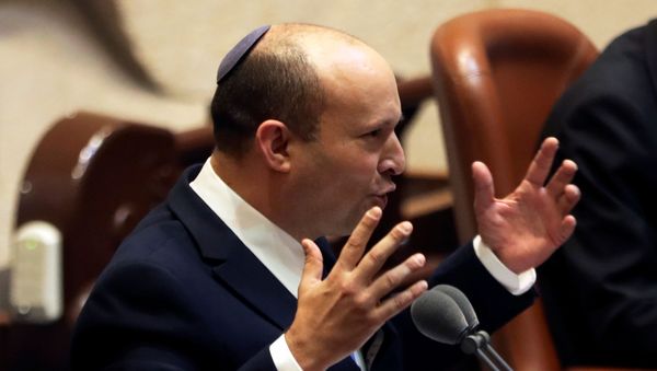 Naftali Bennett, Prime Minister-designate, gestures as he speaks at the Knesset, Israel's parliament, during a special session whereby a confidence vote will be held to approve and swear-in a new coalition government, in Jerusalem June 13, 2021. Naftali Bennett, Prime Minister-designate, gestures as he speaks at the Knesset, Israel's parliament, during a special session whereby a confidence vote will be held to approve and swear-in a new coalition government, in Jerusalem June 13, 2021. - Sputnik International