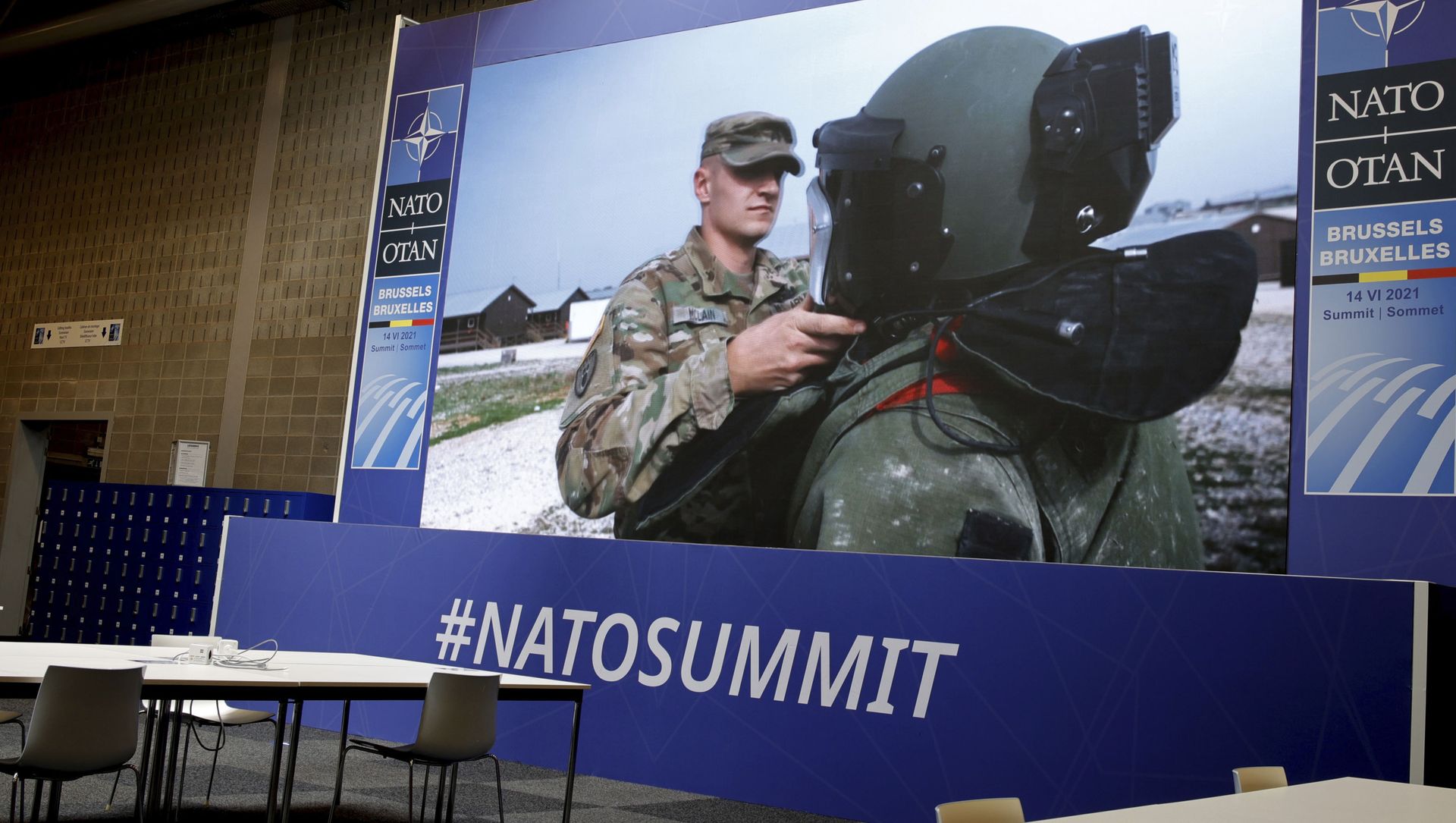 NATO troops are shown on a large screen in an empty press room at NATO headquarters prior to a NATO summit in Brussels, Sunday, June 13, 2021. NATO troops are shown on a large screen in an empty press room at NATO headquarters prior to a NATO summit in Brussels, Sunday, June 13, 2021. - Sputnik International, 1920, 13.06.2021