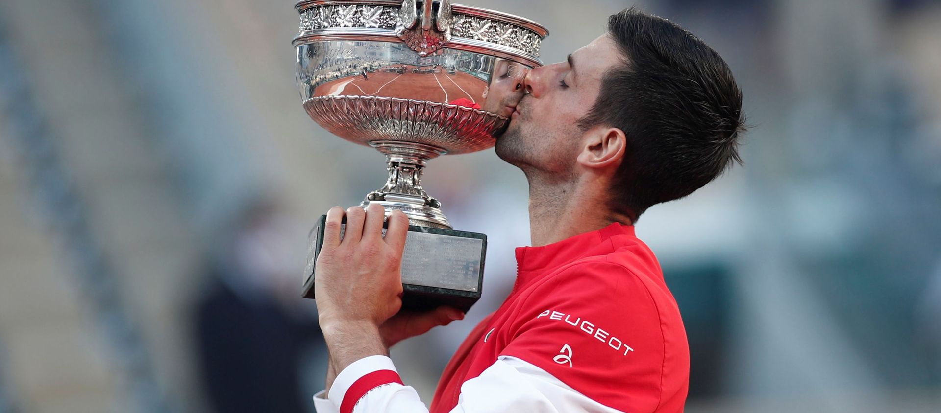 Tennis - French Open - Roland Garros, Paris, France - June 13, 2021 Serbia's Novak Djokovic celebrates with the trophy after winning the French Open against Greece's Stefanos Tsitsipas  - Sputnik International, 1920, 14.06.2021