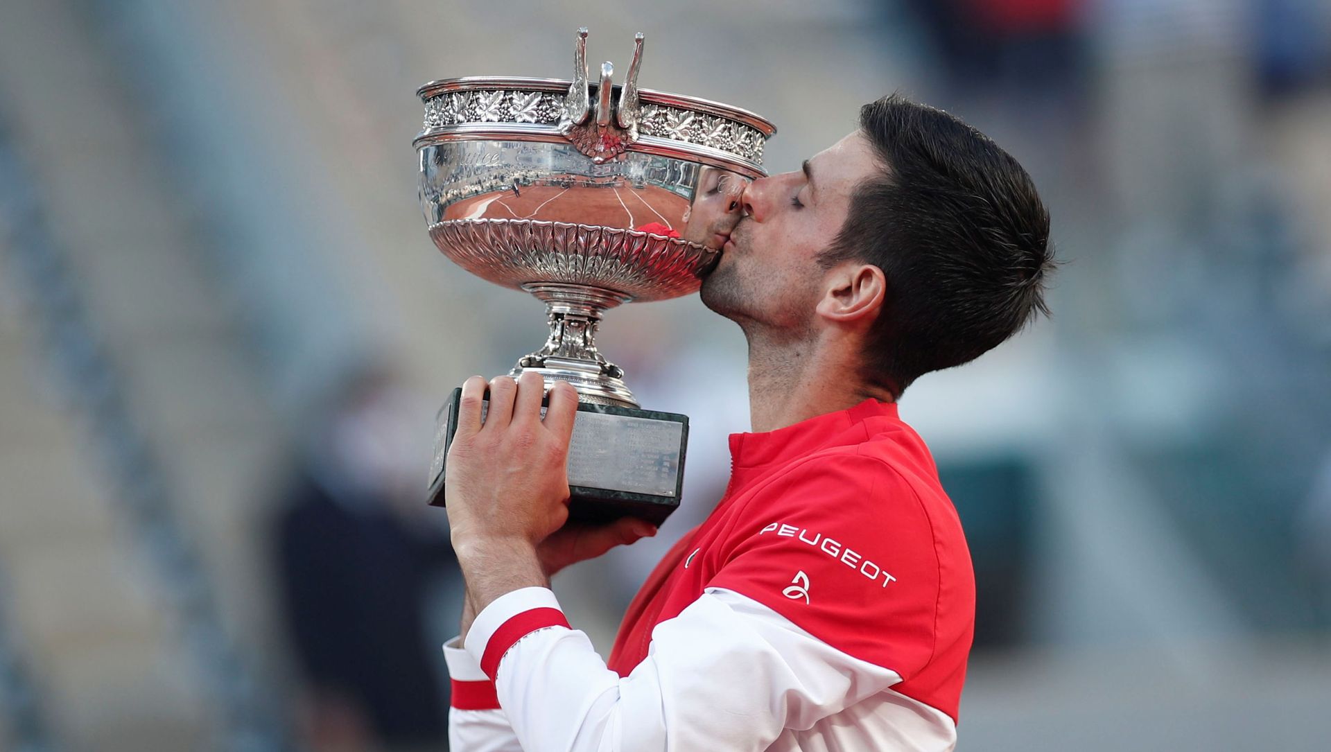Tennis - French Open - Roland Garros, Paris, France - June 13, 2021 Serbia's Novak Djokovic celebrates with the trophy after winning the French Open against Greece's Stefanos Tsitsipas Tennis - French Open - Roland Garros, Paris, France - June 13, 2021 Serbia's Novak Djokovic celebrates with the trophy after winning the French Open against Greece's Stefanos Tsitsipas - Sputnik International, 1920, 14.06.2021