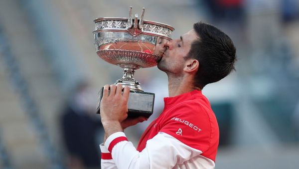 Tennis - French Open - Roland Garros, Paris, France - June 13, 2021 Serbia's Novak Djokovic celebrates with the trophy after winning the French Open against Greece's Stefanos Tsitsipas  - Sputnik International