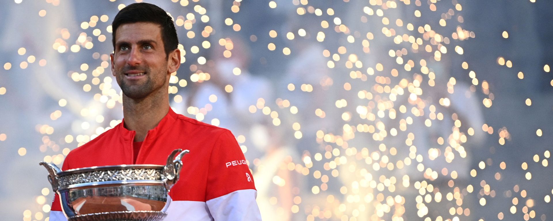 Serbia's Novak Djokovic poses with The Mousquetaires Cup (The Musketeers) after winning against Greece's Stefanos Tsitsipas at the end of their men's final tennis match on Day 15 of The Roland Garros 2021 French Open tennis tournament in Paris on June 13, 2021. Serbia's Novak Djokovic poses with The Mousquetaires Cup (The Musketeers) after winning against Greece's Stefanos Tsitsipas at the end of their men's final tennis match on Day 15 of The Roland Garros 2021 French Open tennis tournament in Paris on June 13, 2021. - Sputnik International, 1920, 15.01.2022