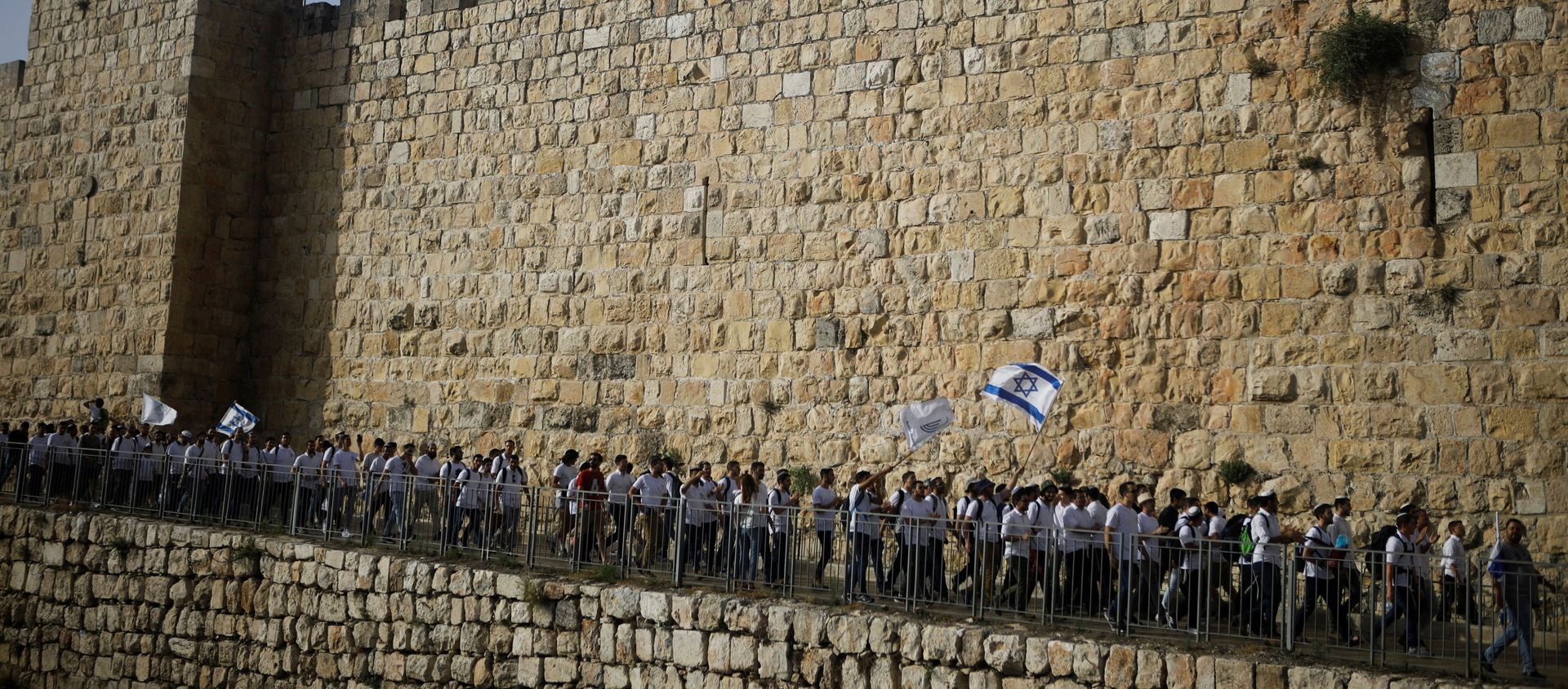 Youths wave Israeli flags during a parade marking Jerusalem Day amid Israeli-Palestinian tension as they march along the walls surrounding Jerusalem's Old City, May 10, 2021. REUTERS/Nir Elias/File Photo Youths wave Israeli flags during a parade marking Jerusalem Day amid Israeli-Palestinian tension as they march along the walls surrounding Jerusalem's Old City, May 10, 2021. REUTERS/Nir Elias/File Photo - Sputnik International, 1920, 16.08.2021