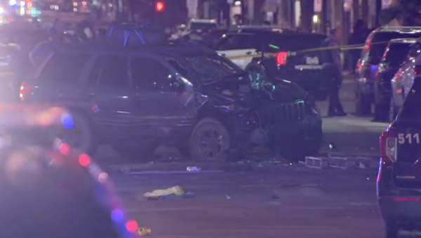 A mangled vehicle sits in the road after ramming into another car outside a protest for Winston Smith, a Black man killed by US Marshals, in Minneapolis, Minnesota on June 13, 2021. - Sputnik International