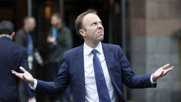 Matt Hancock, Secretary of State for Health and Social Care, walks through the rain to the Conservative Party Conference in Manchester, England, Tuesday, Oct. 1, 2019. Matt Hancock, Secretary of State for Health and Social Care, walks through the rain to the Conservative Party Conference in Manchester, England, Tuesday, Oct. 1, 2019. - Sputnik International