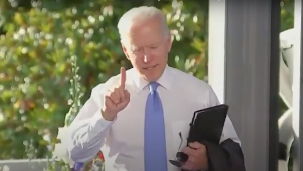 An agitated President Biden responds to a CNN reporter, accusing her of skewing his words about changing Russian President Vladimir Putin's behaviour. - Sputnik International