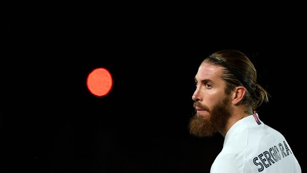 Real Madrid's Spanish defender Sergio Ramos looks on during the UEFA Champions League round of 16 second leg football match between Real Madrid CF and Atalanta at the Alfredo di Stefano stadium in Valdebebas, on the outskirts of Madrid on March 15, 2021 Real Madrid's Spanish defender Sergio Ramos looks on during the UEFA Champions League round of 16 second leg football match between Real Madrid CF and Atalanta at the Alfredo di Stefano stadium in Valdebebas, on the outskirts of Madrid on March 15, 2021 - Sputnik International