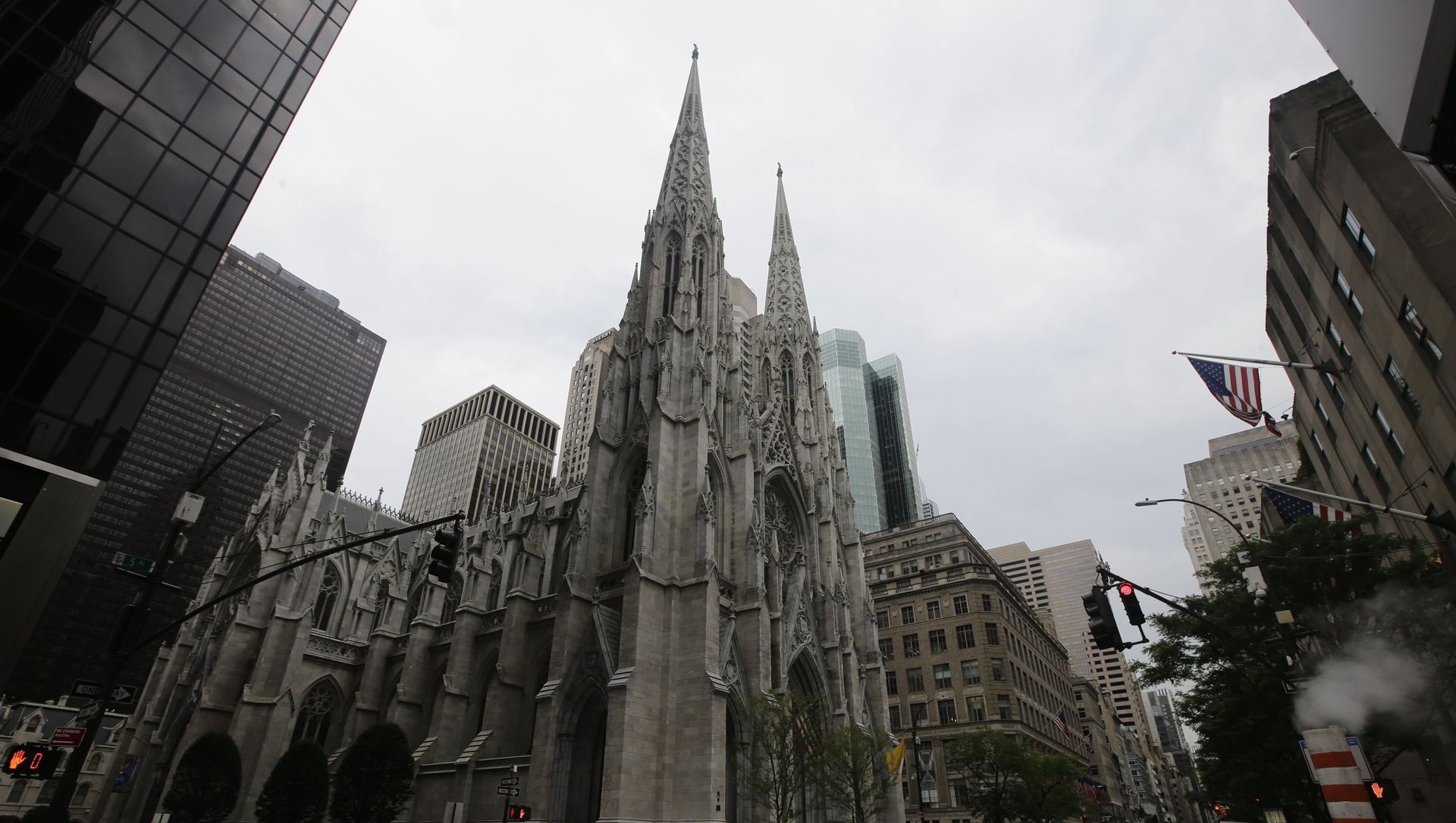 Pedestrians pass St Patrick's Cathedral Wednesday, July 8, 2020, in New York. Pedestrians pass St Patrick's Cathedral Wednesday, July 8, 2020, in New York. - Sputnik International, 1920, 18.06.2021