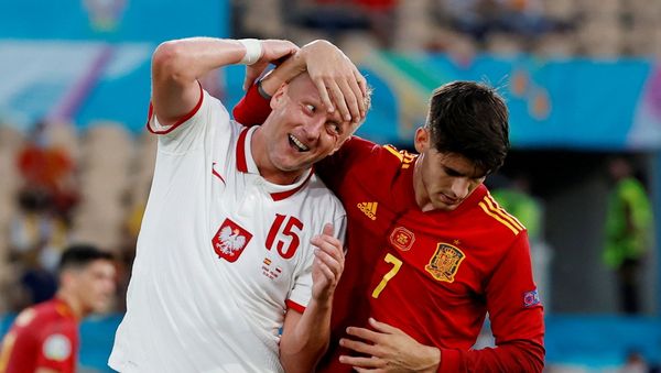 Soccer Football - Euro 2020 - Group E - Spain v Poland - La Cartuja Stadium, Seville, Spain - June 19, 2021 Poland's Kamil Glik in action with Spain's Alvaro Morata Pool via REUTERS/Julio Munoz  - Sputnik International