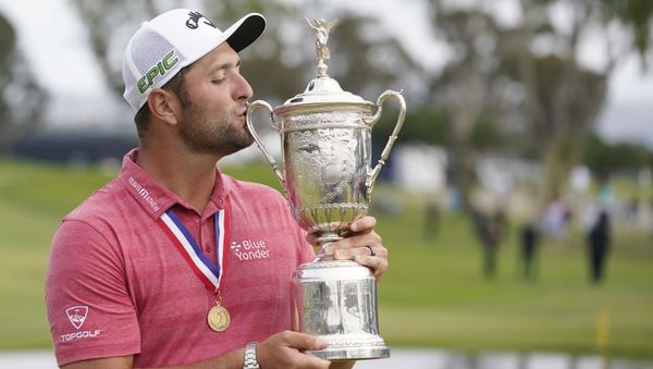 Jon Rahm celebrates and kisses the trophy after winning he U.S. Open golf tournament at Torrey Pines Golf Course, Jun 20, 2021 - Sputnik International