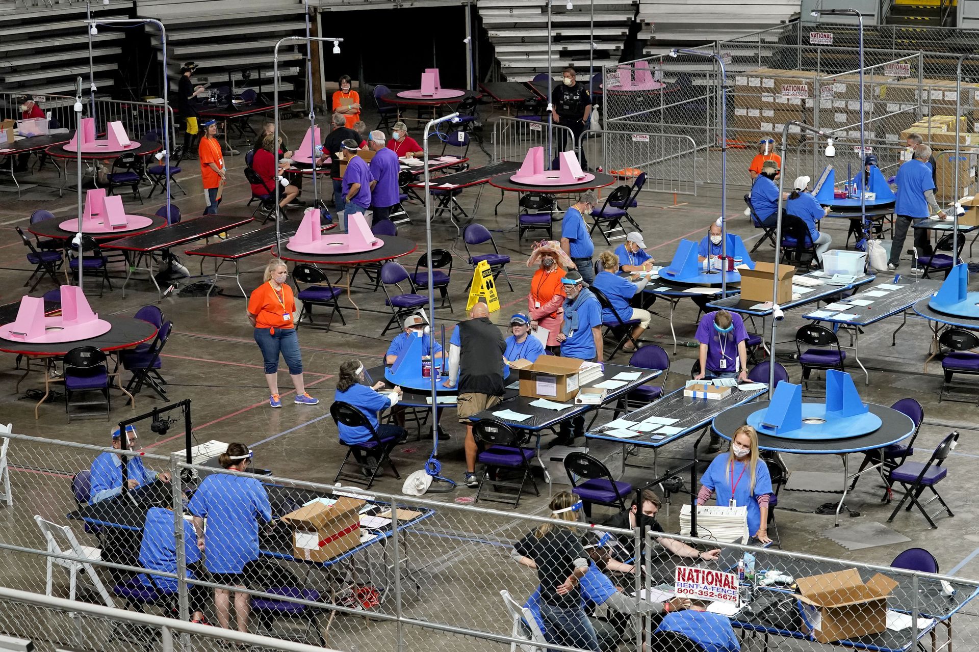 FILE - In this May 6, 2021 file photo, Maricopa County ballots cast in the 2020 general election are examined and recounted by contractors working for Florida-based company, Cyber Ninjas at Veterans Memorial Coliseum in Phoenix. For some conspiracy theorists, the 2020 election still hasn’t ended. Trump supporters are pushing to re-examine ballots from November across the country, and finding success in swing states like Arizona and Georgia. Their efforts and sometimes misleading conclusions are being gleefully amplified by the former president. - Sputnik International, 1920, 05.06.2022