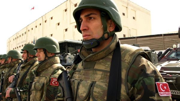 Turkish soldiers in combat gear stand guard outside the headquarters of Camp Anadolu in Kabul, Afghanistan on Thursday, Feb. 11, 2010.  - Sputnik International