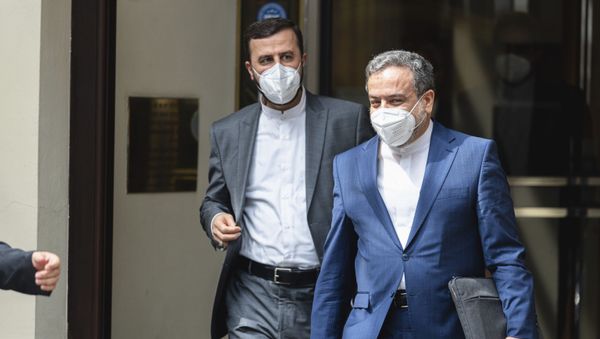 Iran's Governor to the International Atomic Energy Agency (IAEA), Kazem Gharib Abadi, and political deputy at the Ministry of Foreign Affairs of Iran, Abbas Araghchi, from left, leave the 'Grand Hotel Vienna' where closed-door nuclear talks take place in Vienna, Austria, Sunday, June 20, 2021. Iran's Governor to the International Atomic Energy Agency (IAEA), Kazem Gharib Abadi, and political deputy at the Ministry of Foreign Affairs of Iran, Abbas Araghchi, from left, leave the 'Grand Hotel Vienna' where closed-door nuclear talks take place in Vienna, Austria, Sunday, June 20, 2021. - Sputnik International