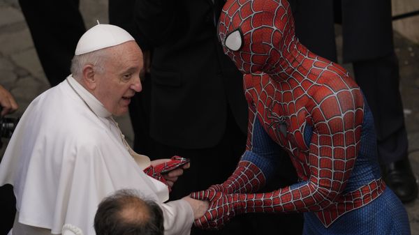 Pope Francis meets Spider-Man, who presents him with his mask, at the end of his weekly general audience with a limited number of faithful in the San Damaso Courtyard at the Vatican, Wednesday, June 23, 2021. The masked man works with sick children in hospitals. - Sputnik International