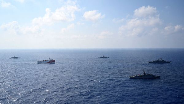 In this photo provided by the Turkish Defense Ministry, Turkey's research vessel, Oruc Reis, in red and white, is surrounded by Turkish navy vessels as it was heading in the west of Antalya on the Mediterranean, Turkey, Monday, Aug 10, 2020. - Sputnik International