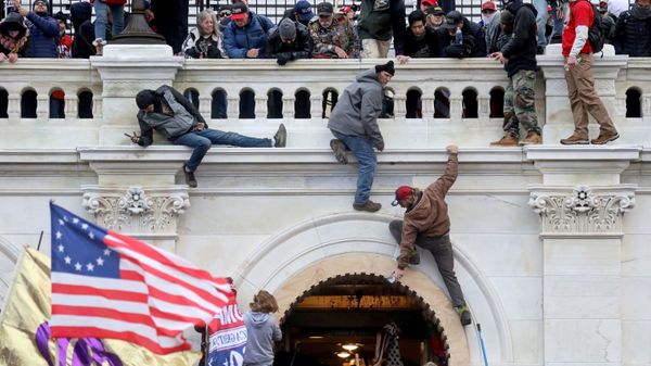 A mob of supporters of U.S. President Donald Trump fight with members of law enforcement at a door they broke open as they storm the U.S. Capitol Building in Washington, U.S., January 6, 2021. - Sputnik International