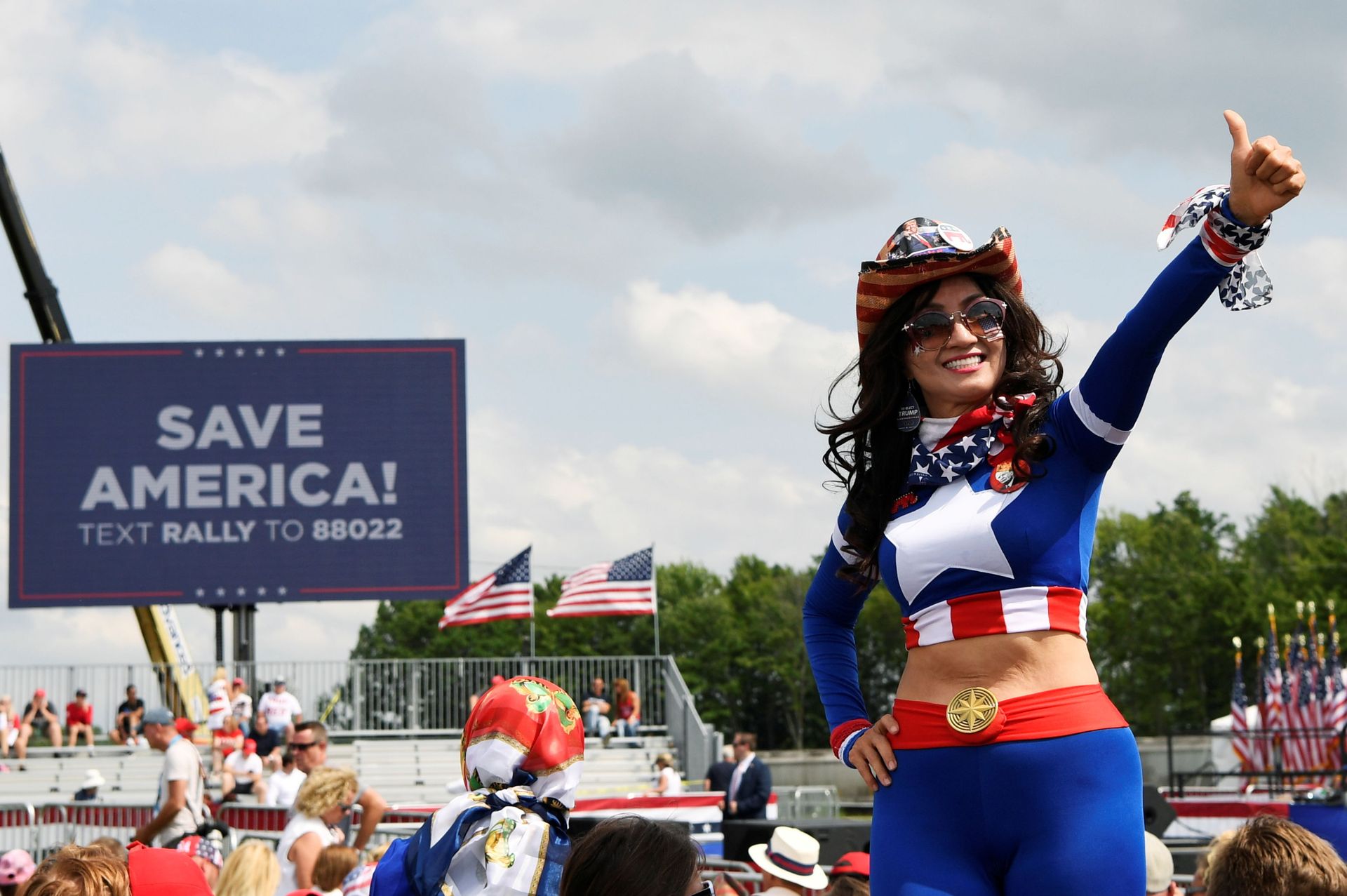 A supporter of former U.S. President Donald Trump gives a thumbs-up during his first post-presidency campaign rally at the Lorain County Fairgrounds in Wellington, Ohio, U.S., June 26, 2021. - Sputnik International, 1920, 07.09.2021