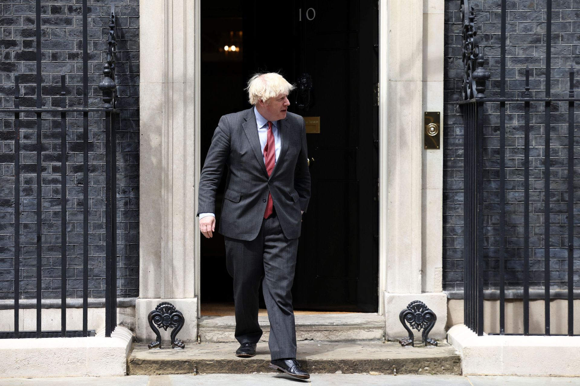 Britain's Prime Minister Boris Johnson walks at Downing Street in London Britain's Prime Minister Boris Johnson walks at Downing Street in London - Sputnik International, 1920, 07.09.2021