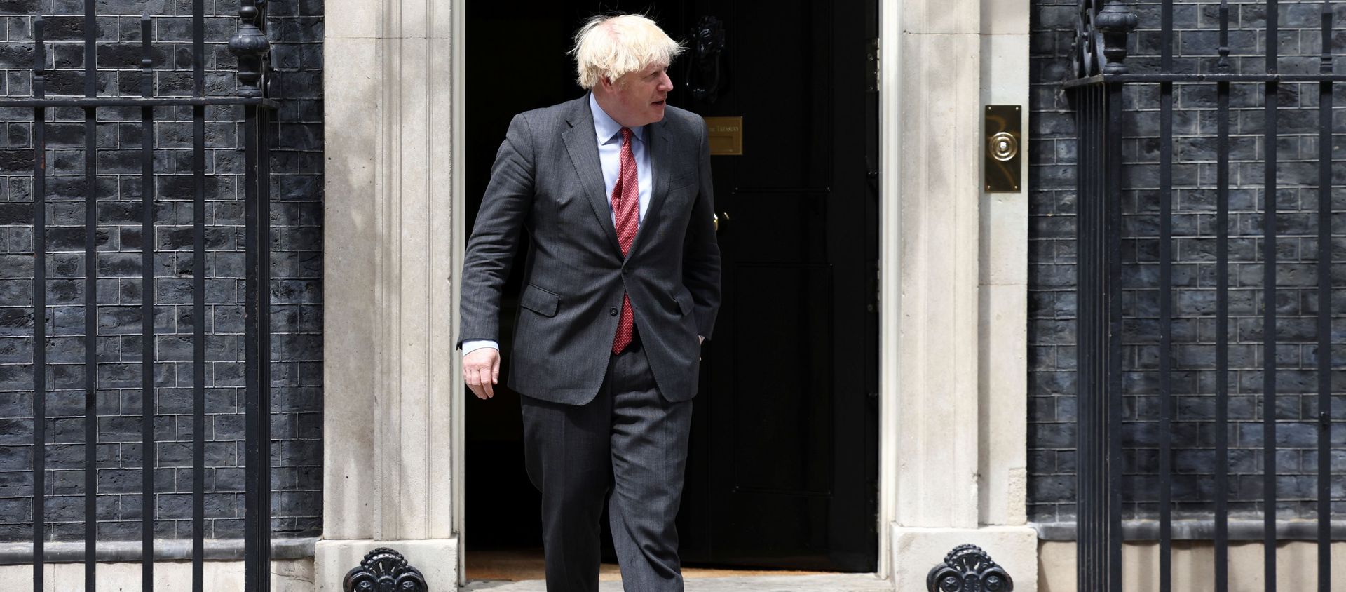 Britain's Prime Minister Boris Johnson walks at Downing Street in London Britain's Prime Minister Boris Johnson walks at Downing Street in London - Sputnik International, 1920, 27.06.2021