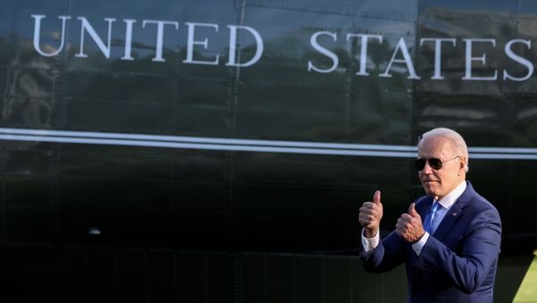 U.S. President Joe Biden reacts as he walks to board the Marine One helicopter to depart for Camp David from the White House in Washington, U.S. June 25, 2021. REUTERS/Jonathan Ernst - Sputnik International