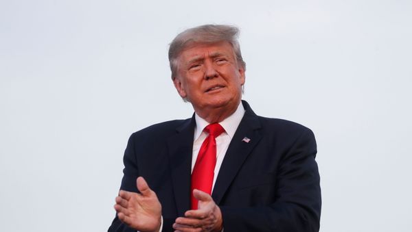 Former U.S. President Donald Trump reacts during his first post-presidency campaign rally at the Lorain County Fairgrounds in Wellington, Ohio, U.S., June 26, 2021 - Sputnik International