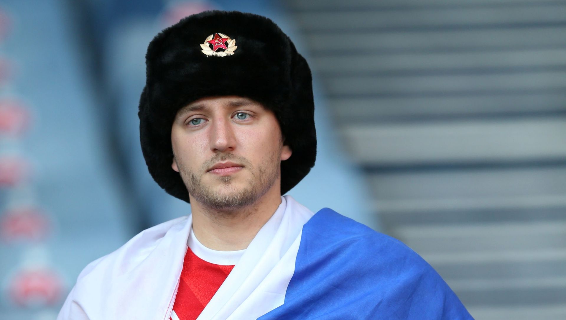 Fan with Russian flag in the stands before the match Fan with Russian flag in the stands before the match - Sputnik International, 1920, 30.06.2021