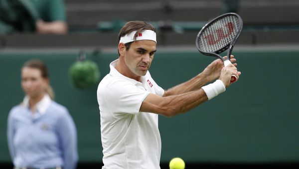 Tennis - Wimbledon - All England Lawn Tennis and Croquet Club, London, Britain - June 29, 2021 Switzerland's Roger Federer in action during his first round match against Fance's Adrian Mannarino - Sputnik International