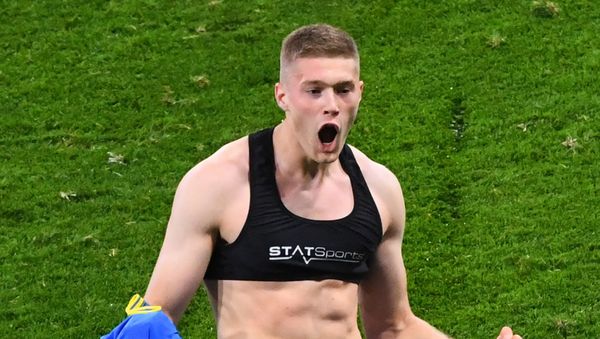 Soccer Football - Euro 2020 - Round of 16 - Sweden v Ukraine - Hampden Park, Glasgow, Scotland, Britain - June 29, 2021 Ukraine's Artem Dovbyk celebrates scoring their second goal Pool via REUTERS/Andy Buchanan - Sputnik International
