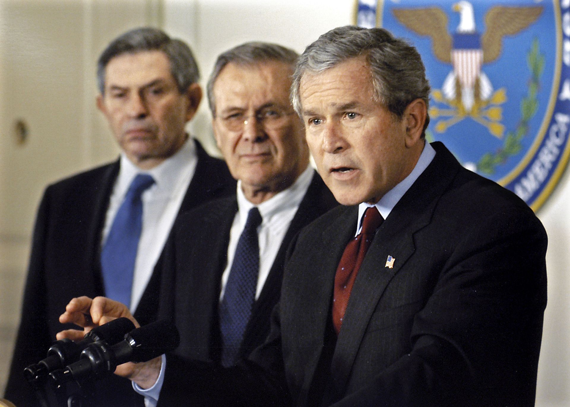 President George W. Bush announces his $74.7 billion wartime supplemental budget request in the Pentagon on March 25, 2003, as Secretary of Defense Donald H. Rumsfeld (center) and Deputy Secretary of Defense Paul Wolfowitz (left) look on. President George W. Bush announces his $74.7 billion wartime supplemental budget request in the Pentagon on March 25, 2003, as Secretary of Defense Donald H. Rumsfeld (center) and Deputy Secretary of Defense Paul Wolfowitz (left) look on. - Sputnik International, 1920, 07.09.2021