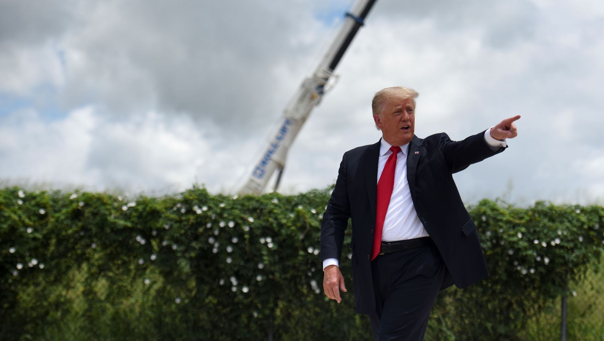 Former U.S. President Donald Trump exits the stage after visiting an unfinished section of the wall along the U.S.-Mexico border with Texas Governor Greg Abbott in Pharr, Texas, U.S. June 30, 2021. Former U.S. President Donald Trump exits the stage after visiting an unfinished section of the wall along the U.S.-Mexico border with Texas Governor Greg Abbott in Pharr, Texas, U.S. June 30, 2021. - Sputnik International, 1920, 01.07.2021