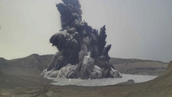In this image made from video from Philippine Institute of Volcanology and Seismology - Department of Science and Technology, a plume of steam and ash is seen from Taal Volcano, Batangas province, Philippines on Thursday July 1, 2021. - Sputnik International