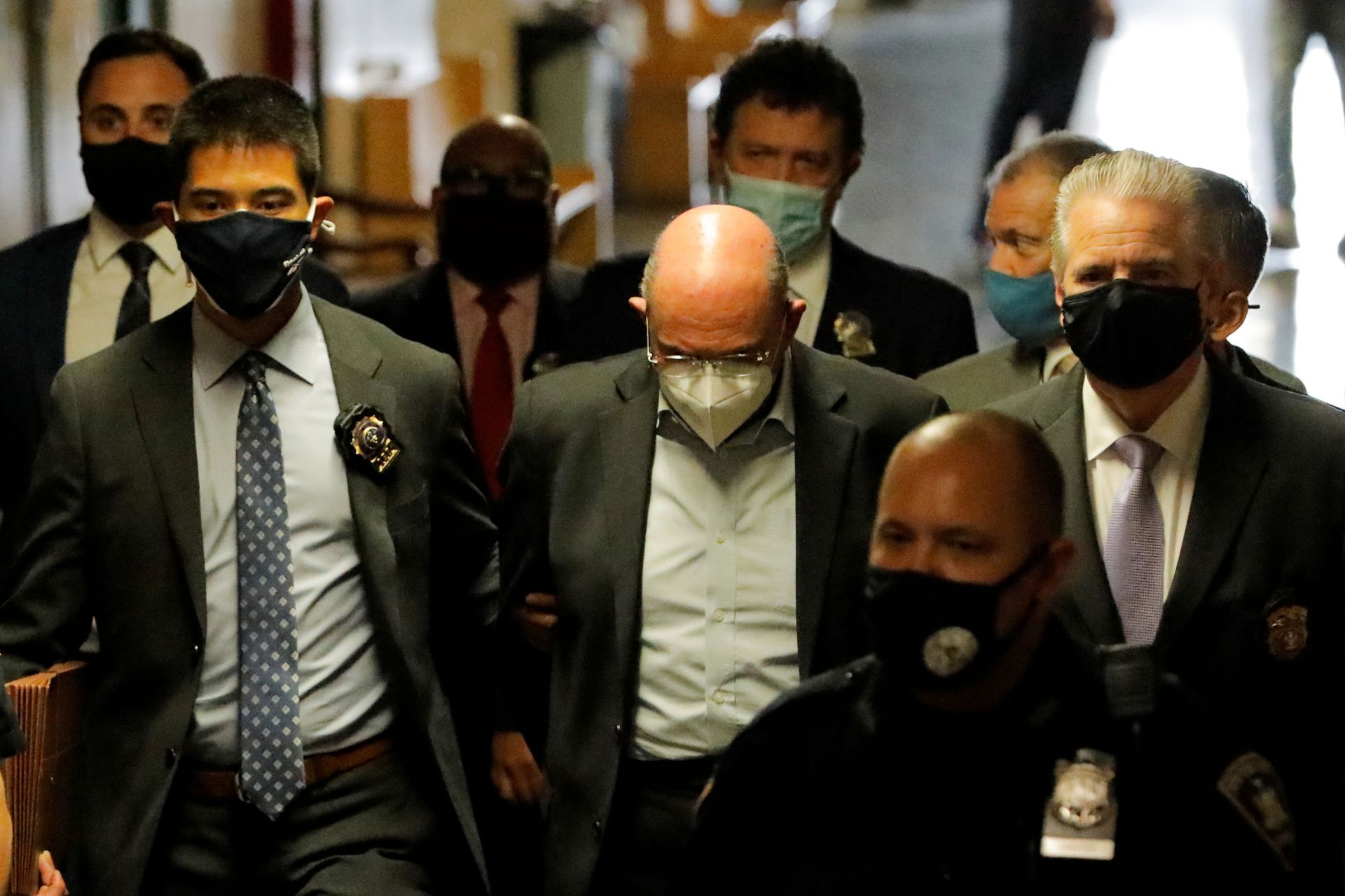 Trump Organization chief financial officer Allen Weisselberg is escorted as he attends his arraignment hearing in the New York State Supreme Court in the Manhattan borough of New York City, New York, U.S., July 1, 2021. REUTERS/Andrew Kelly - Sputnik International, 1920, 07.09.2021