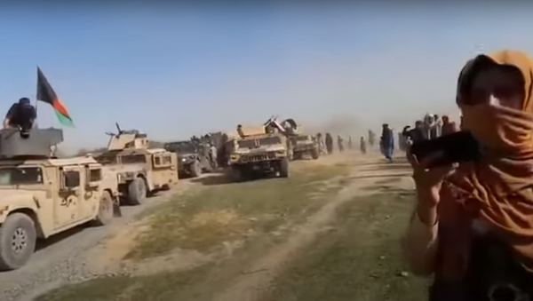 Screenshot appearing to show the surrender of Afghan National Army troops to the Taliban, June 2021. - Sputnik International